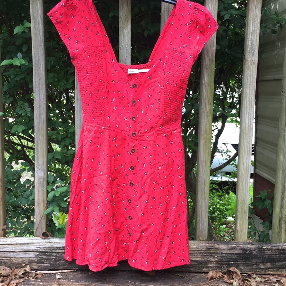 Red floral front button dress.